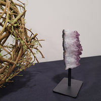 Amethyst Geode Cluster on a Black Stand