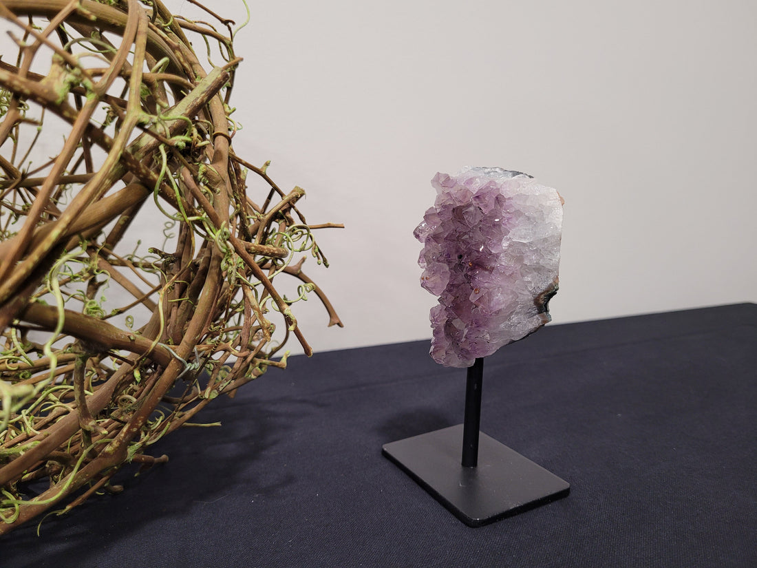 Amethyst Geode Cluster on a Black Stand